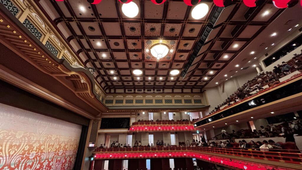 The auditorium at Minami-za, with its coffered ceiling, chandelier and three tiers of boxes